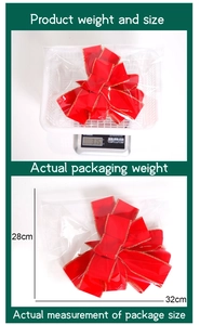 Detailed view of red Christmas bow dimensions 28x32cm with weight scale measurement