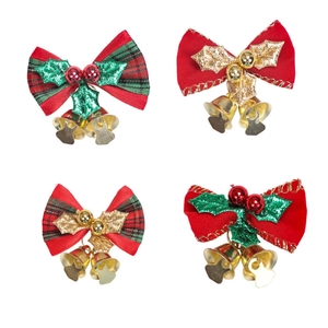 Red and green Christmas velvet bows with holly berries and gold bells for tree decoration