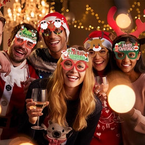 Close-up of five people wearing various Christmas party glasses with reindeer and Santa designs