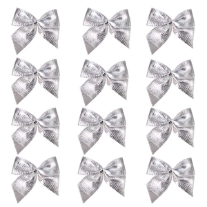Set of 12 silver festive mini bows with metallic glitter texture for Christmas decor