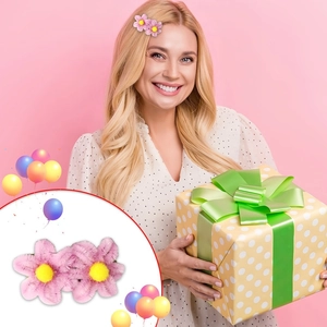 Close-up of pink plush flower hair clips for kids with cute six-petal design