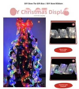 Detail of LED Christmas ribbon showing warm white glow and sheer gauze mesh texture
