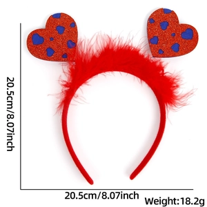 Detailed view of red feather headband with glitter hearts including size and weight specs