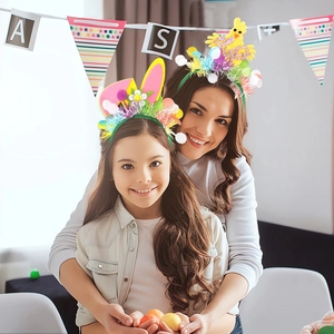 Close-up of Easter headbands featuring plush bunny ears and chicks for festive parties