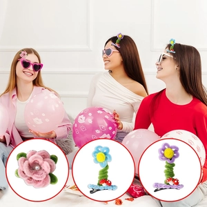 Detail of colorful plush flower hair clips with spiral stems and mushroom accents