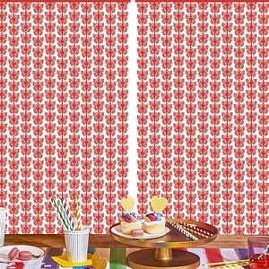Close-up of red butterfly cut-out foil curtain used as festive party wall backdrop