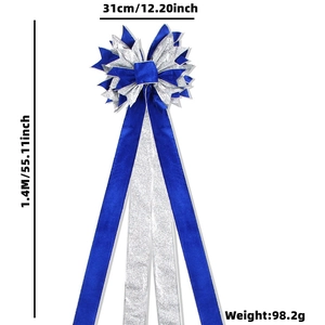 Large royal blue velvet Christmas tree topper bow with silver glitter and long tassels