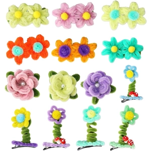 Handmade plush flower hair clips for children featuring colorful pipe cleaner designs