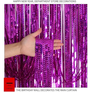 Close-up of shiny purple metallic foil fringe curtain for festive party wall decoration