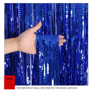 Close-up of deep blue laser foil fringe curtain with metallic reflective texture for party decor