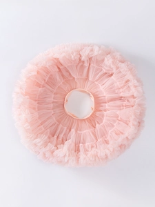 Pink layered mesh tutu skirt for girls featuring an elastic waistband and fluffy design