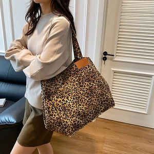 Large leopard print canvas tote bag for women with leather patch and wide shoulder straps
