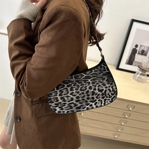 Retro leopard print underarm bag for women featuring classic animal pattern and slim strap
