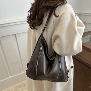 Large dark brown vintage leather tote bag with silver zippers for women autumn style