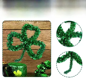Close-up of green tinsel shamrock garland decorations for St. Patrick's Day celebration