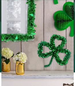 Close-up of green clover tinsel garland for St. Patrick's Day party home decoration