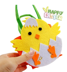 Detail of yellow Easter chick felt gift bag with green handle and happy easter text