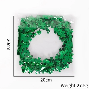 Saint Patricks Day green tinsel garland with clover sequins 20cm diameter detail