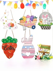 Detailed view of colorful wooden Easter ornaments featuring bunnies carrots and eggs