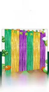 Macro detail of 2m green, purple and gold metallic fringe curtains for festive backdrop
