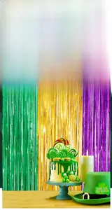 Detail of green gold purple tinsel foil fringe curtain for St. Patrick's Day party backdrop