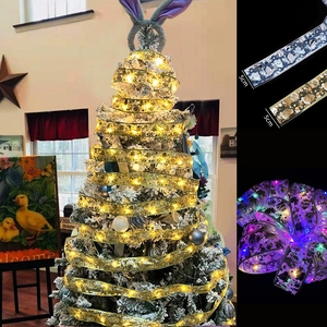 Close-up of 5cm LED Easter ribbon with colorful lights and festive gold stamping patterns