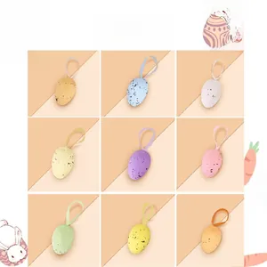 Detailed view of nine colorful speckled Easter foam eggs with hanging strings for decor