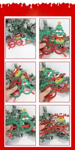 Detail of Christmas glasses with festive glitter, reindeer antlers and Xmas lettering
