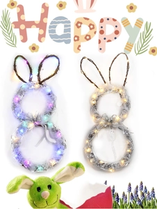 Detail of Easter bunny rattan wreaths with LED lights and silver lace ribbon accents