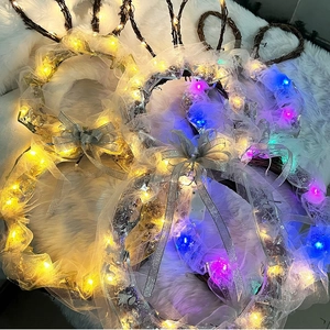Luminous Easter bunny wreath with natural branch base and glowing LED lights for holiday decor