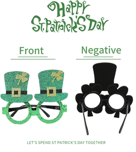 Front and back detail of glittery St. Patrick's Day glasses with shamrock and green hat