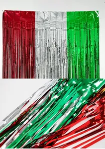 Detailed macro view of red, silver, and green metallic foil fringe curtains for party decor