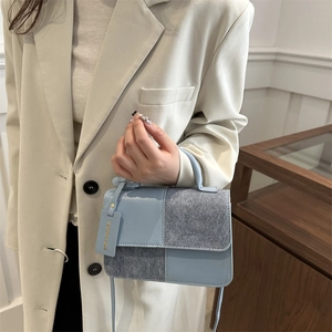 Minimalist square crossbody bag in light blue and grey patchwork leather for women