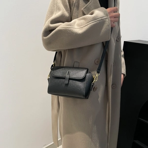 Chic black litchi leather square crossbody bag for women with gold hardware