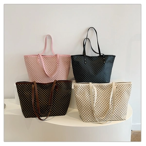 Detail view of large tote bags in four colors with high-quality checkered texture finish