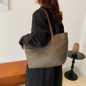 Vintage large-capacity tote bag with monogram canvas and leather straps for commuting