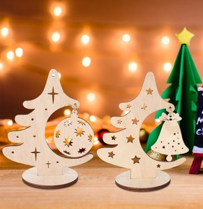 Macro view of wooden Christmas tree ornaments with laser-cut stars and metal bells