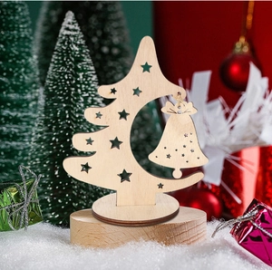 Macro detail of wooden Christmas tree stand with hollow star and hanging metal bell