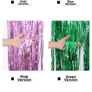 Close-up of pink and green laser foil fringe curtains showing texture and shimmer