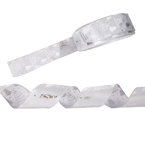 Silver Christmas ribbon with festive printed letters Joy Love Peace and star patterns
