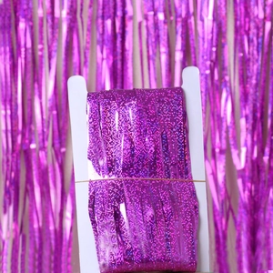 Close-up of rose purple laser tinsel fringe curtain wrapped on display card
