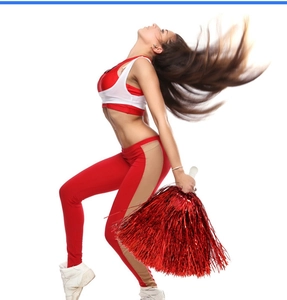 Action shot of metallic red cheerleader pom poms with handle for sports cheering events