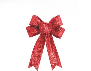 Close-up of red glitter Christmas bow with edge-stitching for gift wrap decor
