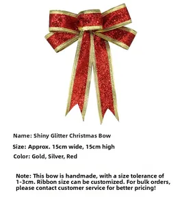 Close-up of red glitter Christmas bow with gold edges for festive tree decoration