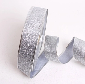 Detail of 10m silver glitter Christmas ribbon with wire edge for gift wrapping