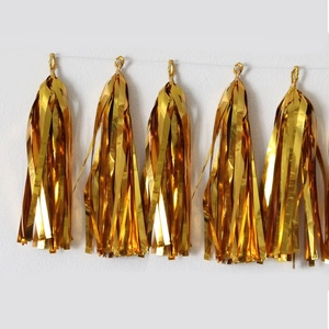 Golden metallic foil tassel garland for festive birthday party and wedding wall decoration