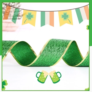 Green ribbon with gold edges for St. Patrick's Day party decor and gift wrapping