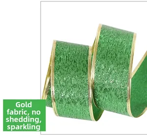 Detail of green and gold festive ribbon with shimmering texture and no-shed gold cloth material