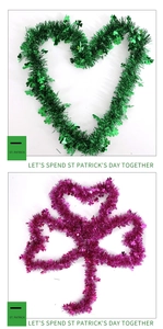 Detail of St. Patrick's Day green tinsel garland with clover and heart shape foil leaves
