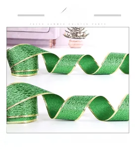 Close-up of St. Patrick’s Day green wired ribbon with gold glitter for gift wrapping